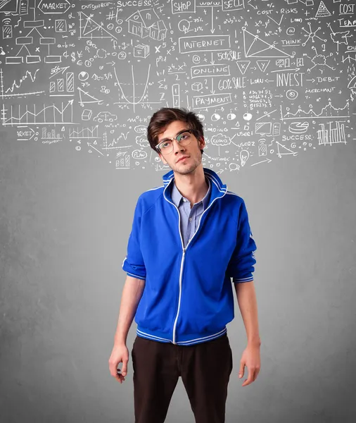 Young handsome guy with hand drawn calculations and icons — Stock Photo, Image