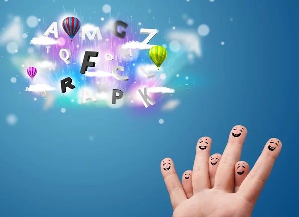 Happy smiley fingers looking at colorful magical clouds and ball — Stock Photo, Image