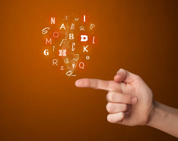 Letters coming out of gun shaped hands — Stock Photo, Image