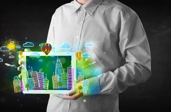 Young person showing tablet with hand drawn cityscape — Stock Photo, Image