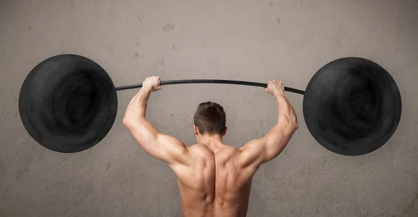 Muscular hombre levantamiento de pesas — Foto de Stock