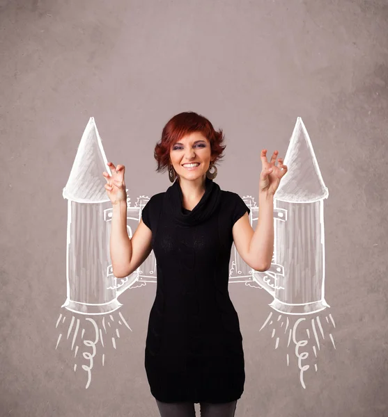 Симпатичная девушка с рисунком ракеты реактивного ранца — стоковое фото
