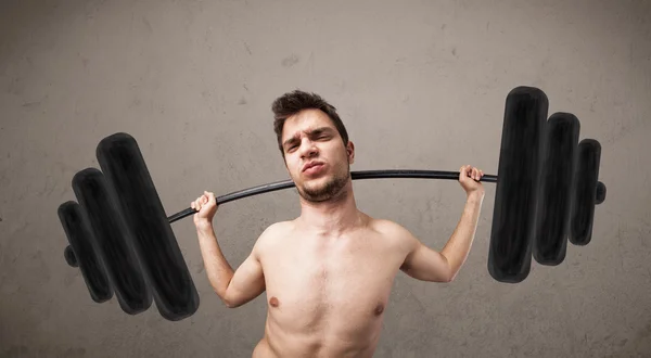 Funny skinny guy lifting weights — Stock Photo, Image