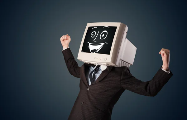 Hombre de negocios feliz con una cabeza de monitor de PC y una cara sonriente — Foto de Stock