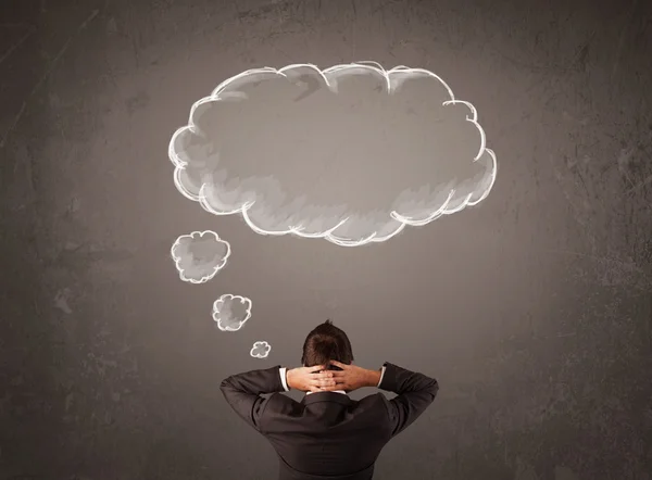 Empresário com a nuvem pensada acima de sua cabeça — Fotografia de Stock