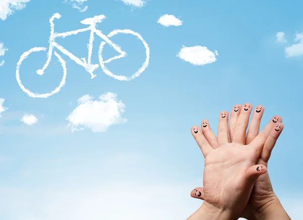 Happy smiley fingers looking at a bicycle shapeed cloud — Stock Photo, Image