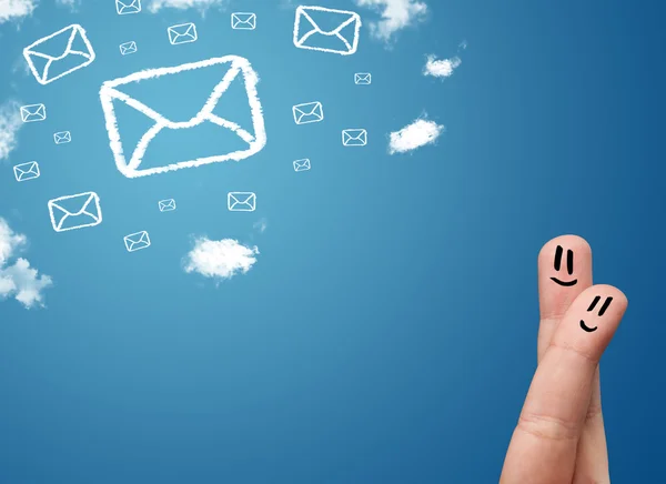 Happy smiley fingers looking at mail icons made out of clouds — Stock Photo, Image