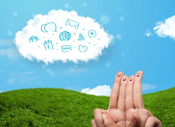 Happy smiley fingers looking at cloud with blue social icons and — Stock Photo, Image