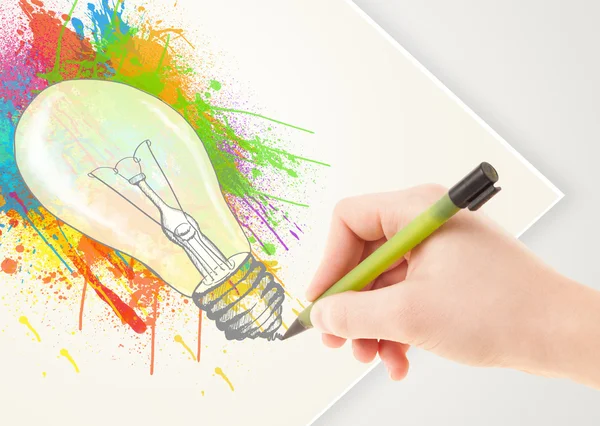 Hand drawing colorful idea light bulb with a pen — Stock Photo, Image