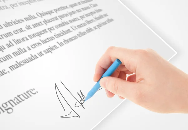 Hand writing personal signature on a paper form — Stock Photo, Image