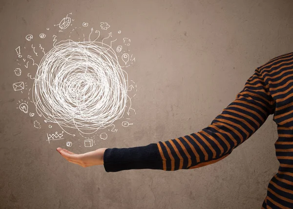 Chaos concept in the hand of a woman — Stock Photo, Image