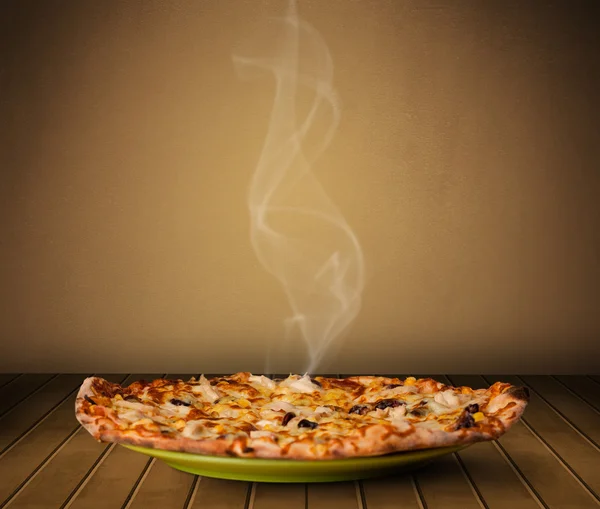 Fresh delicious home cooked pizza with steam — Stock Photo, Image