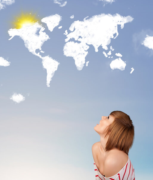 Young girl looking at world clouds and sun on blue sky