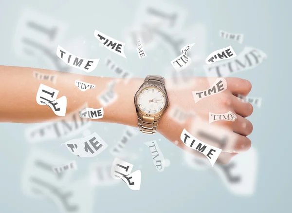 Clock and watch concept with time flying away — Stock Photo, Image