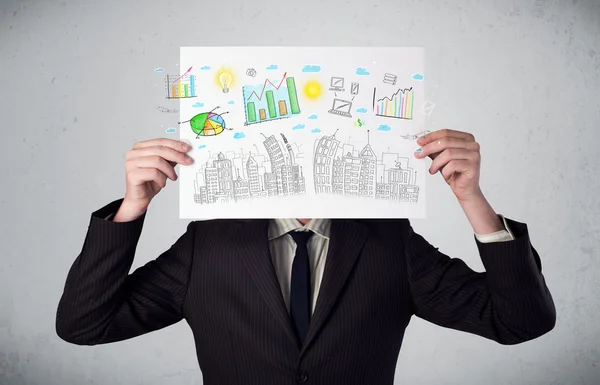 Businessman holding a paper with charts and cityscape in front o — Stock Photo, Image