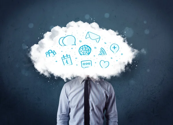 Man in suit with cloud head and blue icons — Stock Photo, Image
