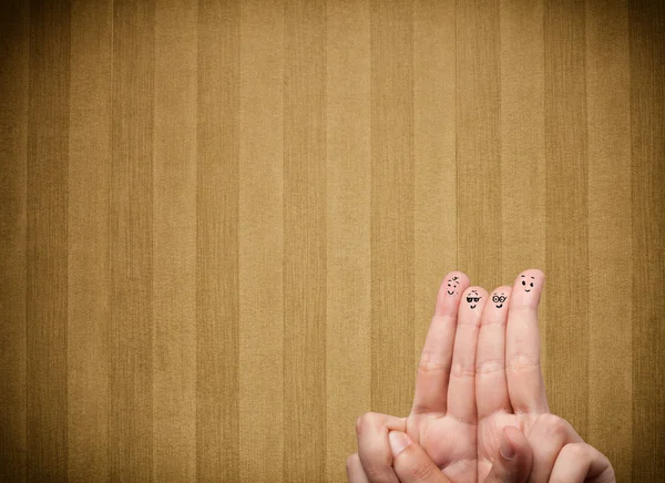 Happy finger smileys with vintage stripe wallpaper background — Stock Photo, Image