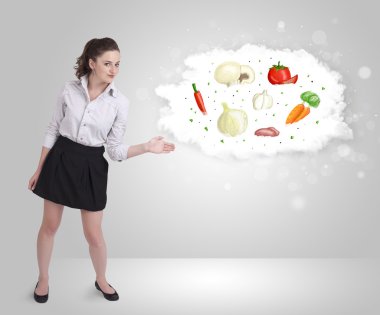 sağlıklı beslenme sebze bulutu sunan güzel bir kadın