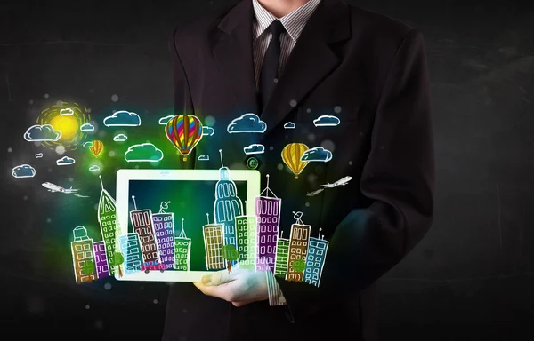 Young person showing tablet with hand drawn cityscape — Stock Photo, Image