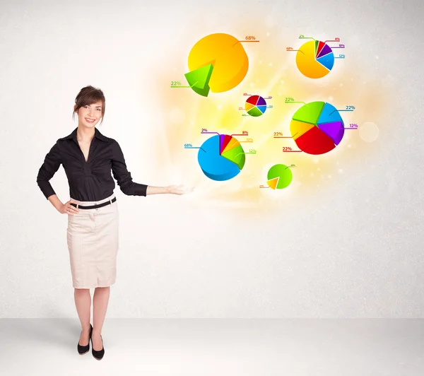 Business woman with colorful graphs and charts — Stock Photo, Image