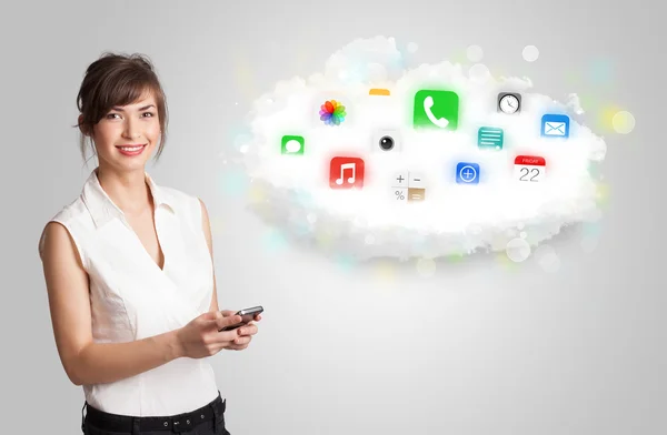 형형색색의 앱 아이콘 과 상징으로 구름을 내보이는 젊은 여자 — 스톡 사진