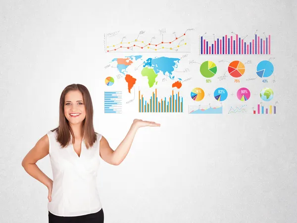 Business woman with colorful graphs and charts — Stock Photo, Image