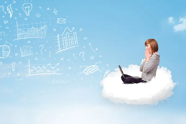 Young woman sitting in cloud with laptop — Stock Photo, Image