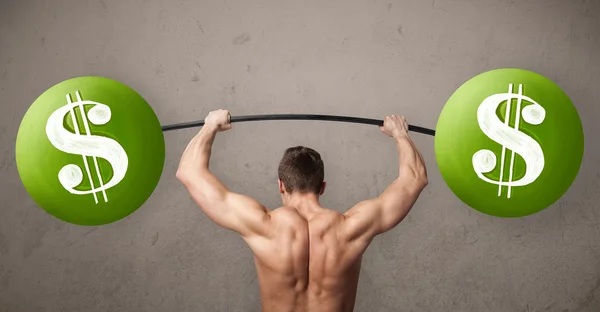 Muscular man lifting green dollar sign weights — Stock Photo, Image