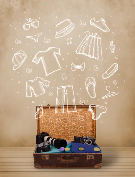 Traveler luggage with hand drawn clothes and icons — Stock Photo, Image