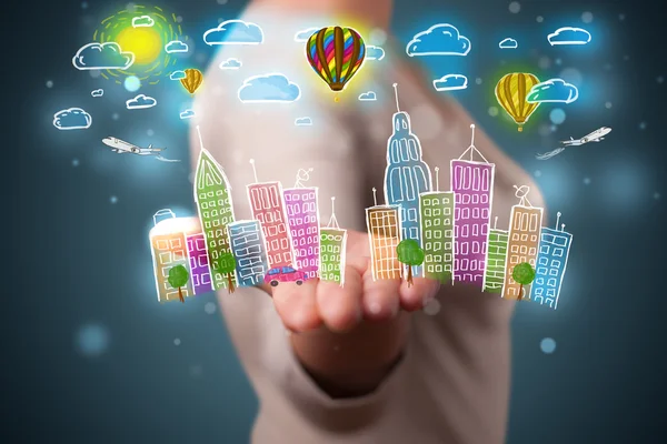 Young woman presenting colorful hand drawn metropolitan city — Stock Photo, Image