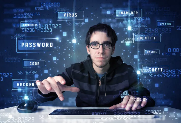 Hacker programing in technology enviroment with cyber icons — Stock Photo, Image