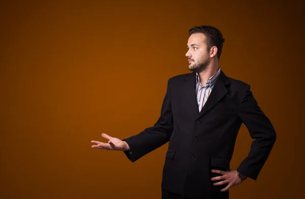 Businessman presenting copy space — Stock Photo, Image