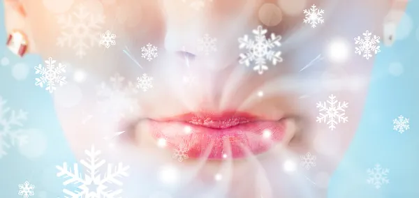 Pretty woman mouth blowing cold breeze — Stock Photo, Image