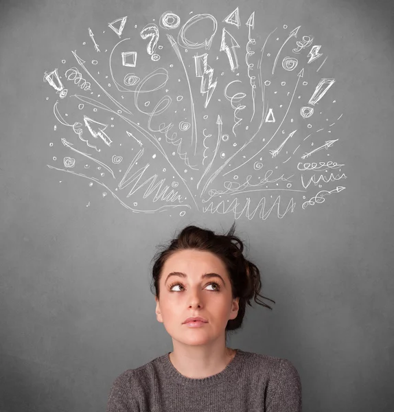 Young woman thinking with sketched arrows above her head — Stock Photo, Image