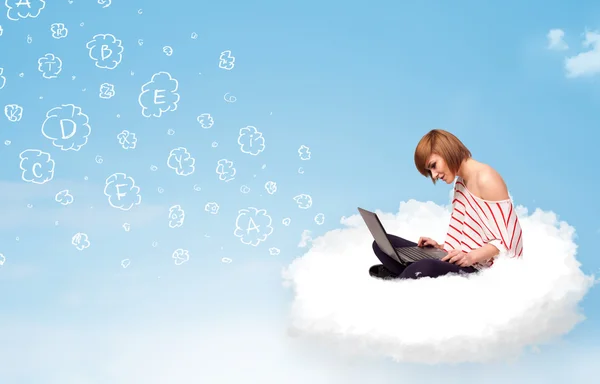 Young woman sitting in cloud with laptop — Stock Photo, Image