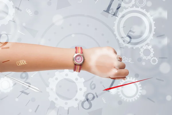 Hand with watch and numbers on the side comming out — Stock Photo, Image