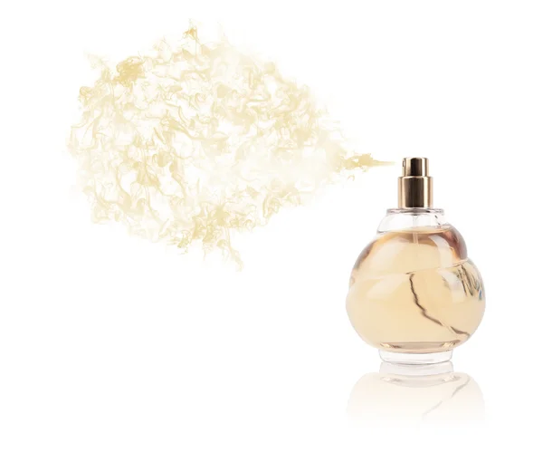 Perfume bottle spraying colored scent — Stock Photo, Image