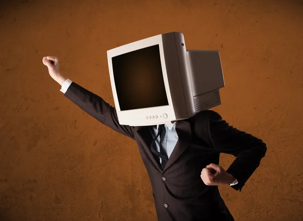 Business man with a monitor on his head and brown empty space — Stock Photo, Image