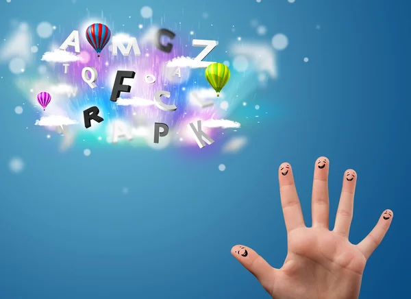 Happy smiley fingers looking at colorful magical clouds and ball — Stock Photo, Image