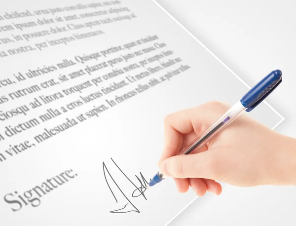 Hand writing personal signature on a paper form — Stock Photo, Image