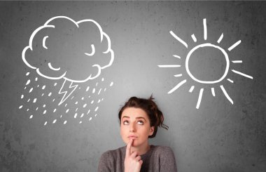 bir güneş ve yağmur çizme arasında duran kadın