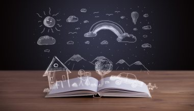 Elle çizilmiş peyzaj ile açık kitap 