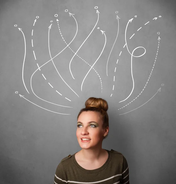 Jonge vrouw met pijlen coming out van haar hoofd — Stockfoto