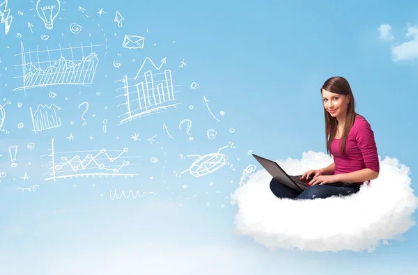 Young woman sitting in cloud with laptop — Stock Photo, Image