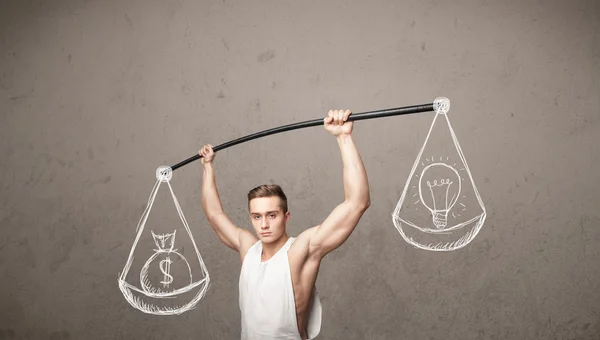 Muscular man trying to get balanced — Stock Photo, Image