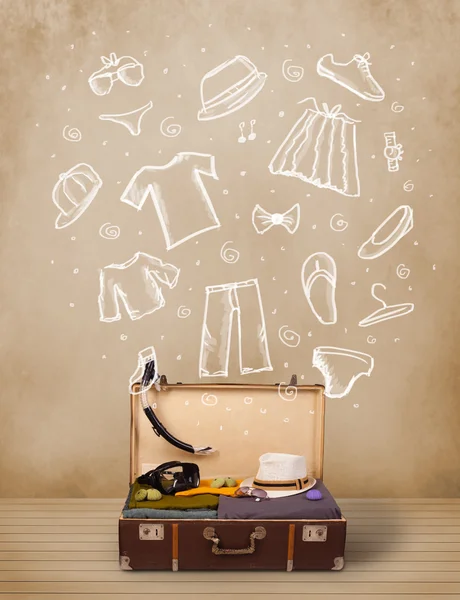 Traveler luggage with hand drawn clothes and icons — Stock Photo, Image