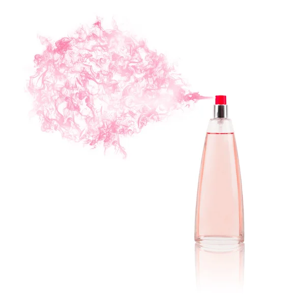 Perfume bottle spraying colored scent — Stock Photo, Image