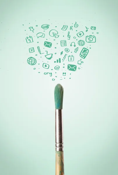 Brush close-up with social media icons — Stock Photo, Image