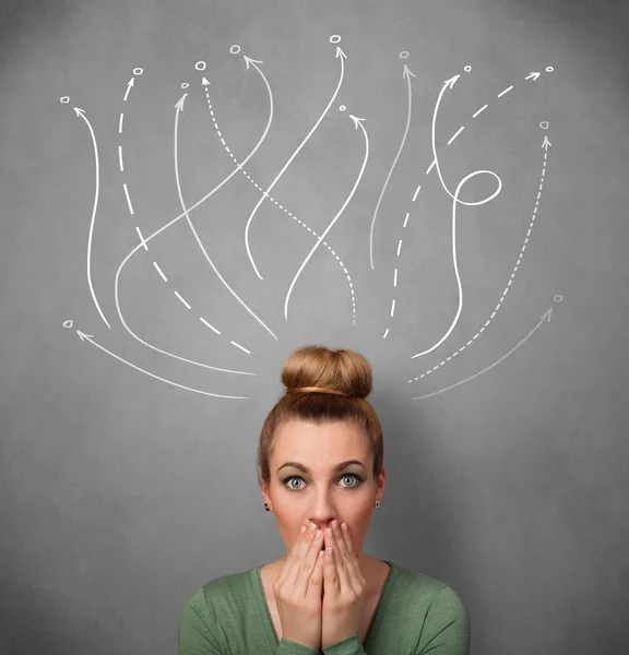 Young woman with arrows coming out of her head — Stock Photo, Image