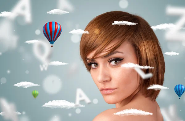 Beautiful young woman with wellness and healthcare clouds — Stock Photo, Image